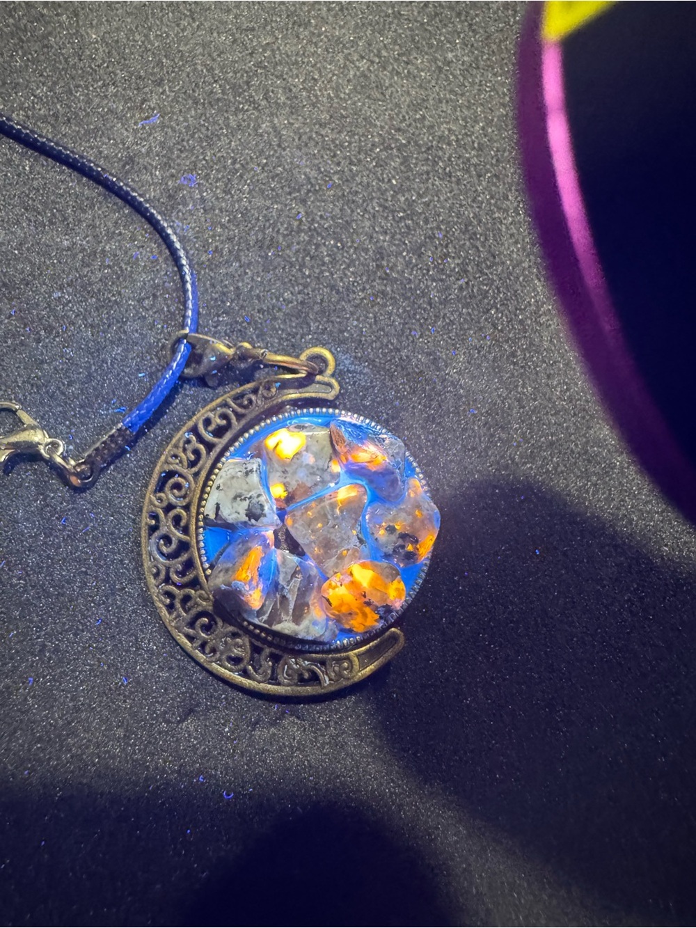 Handmade uv reactive Yooperlite and sunstone pendant charm with free chain